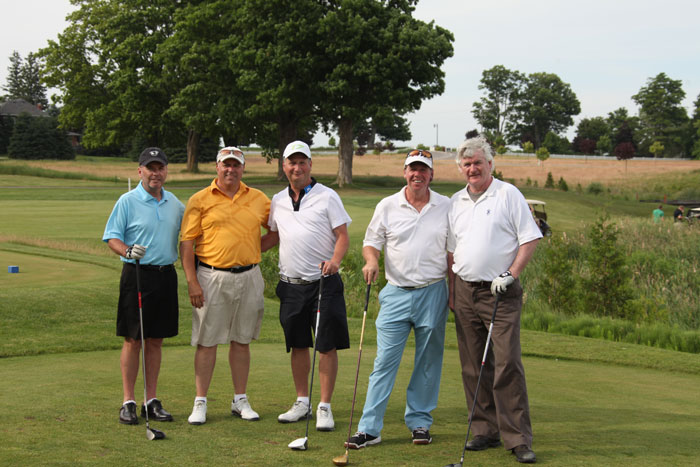 Having fun at the 2012 Ippolito Foundation Golf Tournament at Copetown Woods Golf Club are, from left, Rogers Sportnet’s Scott Morrison, Ippolito Foundation director, Joel Ippolito, the event’s platinum sponsor Phil Caplan of PC Packaging and Design, Graeme Jewett of Marsan Foods and Chair of McDermott House Canada, and singer John McDermott, Founder and President of McDermott House Canada.